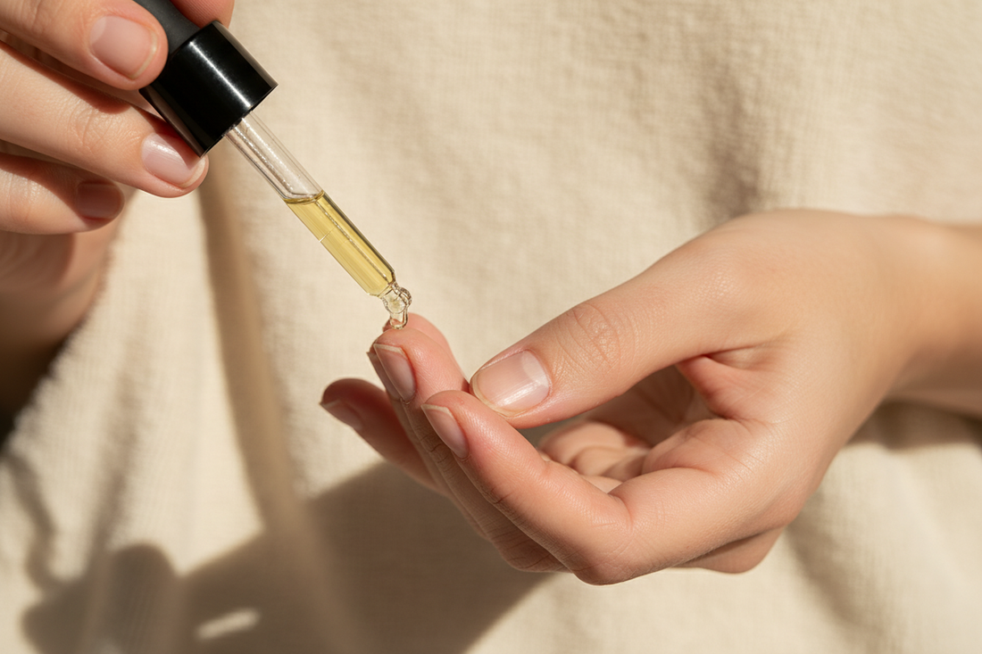 lady repairing her natural nails after acrylic removal damage using oily olive's organic cucticle oil